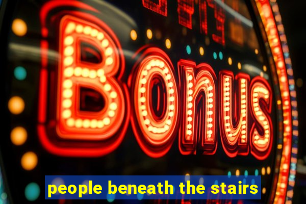 people beneath the stairs